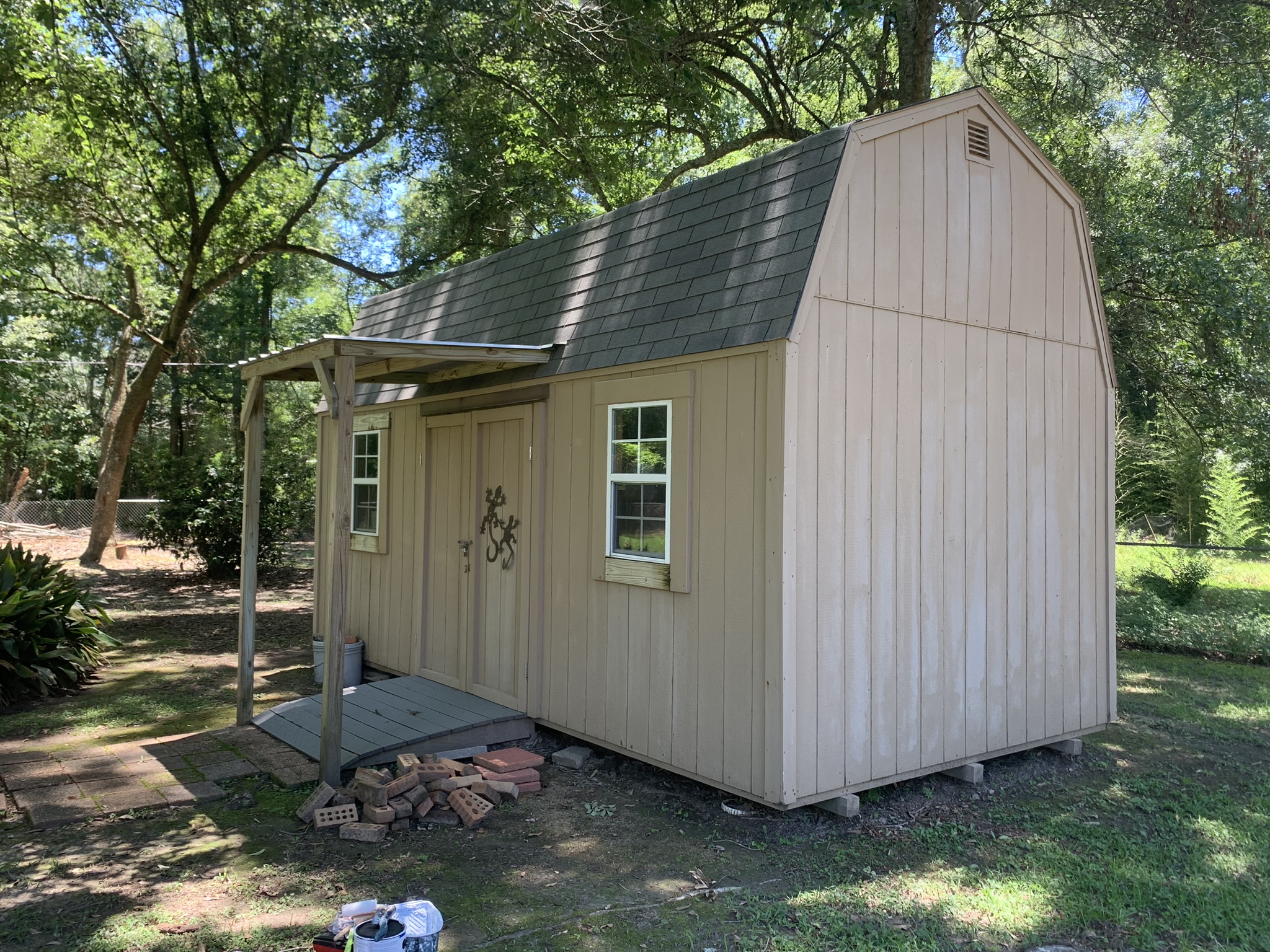 Shed Painted in Kiln MS by local painter Paint Star - brown wooden shed before painting