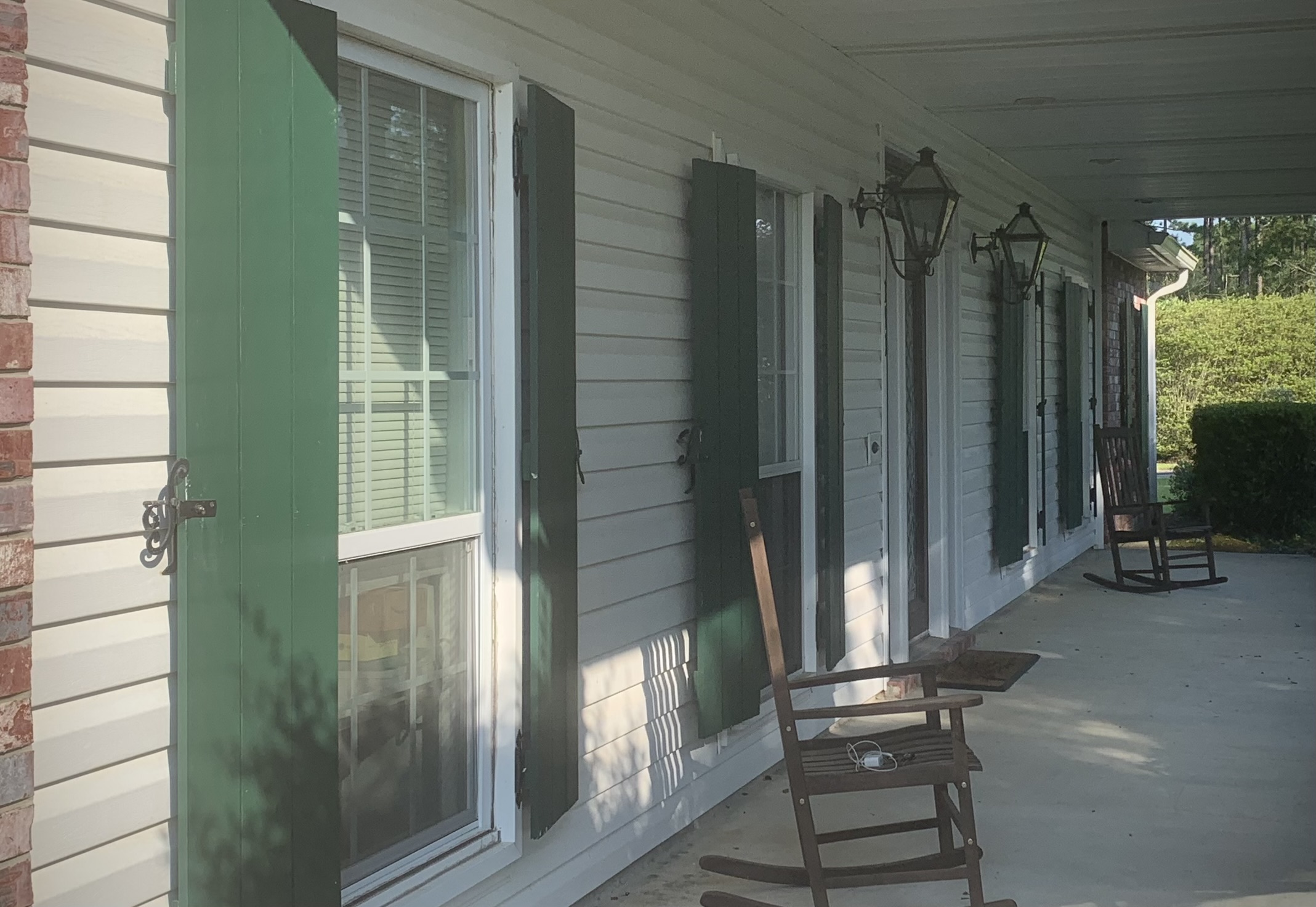 Shutters in Poplarville MS by Paint Star - green shutters on southern home